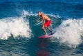 Surfer surfing with waves