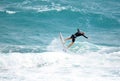 Surfer takes flight as he traverses a big wave off the South Florida coast