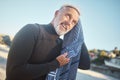 Surfer, towel and swimming with senior man drying hair after a swim, surf and water sports while on a surfing trip Royalty Free Stock Photo