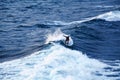 Surfer training in ocean on big waves