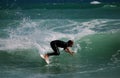 Surfer turning on a wave