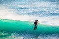 Surfer in wet suit and blue ocean wave. Surfing in blue ocean Royalty Free Stock Photo