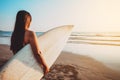 Surfer woman in bikini go to surfing