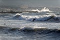 Surfers in the storm