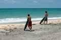 Surfers on beach