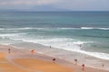 Surfers on the beach in Biarritz, France. Top view. Royalty Free Stock Photo