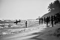 Surfers beach. Surfer on an ocean beach. Water sport activity. Atlantic Ocean, Dominican Republic. 29.12.2016