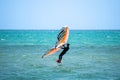 Surfers on beach in Torremolinos, Spain