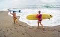 Surfers with board Royalty Free Stock Photo