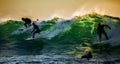 Surfers in breaker