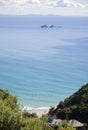 Surfers at Byron Bay Australia overlooking Julian Rocks