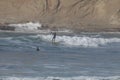 Surfers at Cape Kiwanda During the King Tide of February 2020