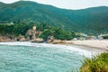 Surfers ctching the waves early in the morning at Big Wave Beach in Hong Kong  - 3 Royalty Free Stock Photo