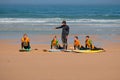 Surfers getting surfers lessons in Portugal