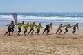 Surfers getting surfing lessons at Praia Vale Figueiras in Portugal