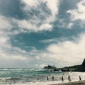 Surfers on Hamoa Beach, Maui. Hawaii