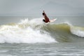 Surfers having a good day playing with waves