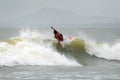 Surfers having a good day playing with waves