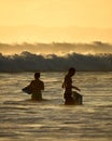 Surfers in Kauai, Hawaii Royalty Free Stock Photo