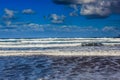 Surfers and kiters in the water on Famara beach