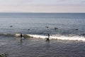 Surfers in Malibu beach, waiting for the waves in summer time in California