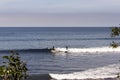 Surfers in Malibu beach, waiting for the waves in summer time in California