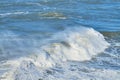 Surfers in the ocean, big waves, Nazare, Portugal