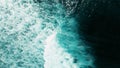 Surfers in the open ocean wait for a wave near Green Bowl Beach, Bali, Indonesia Royalty Free Stock Photo