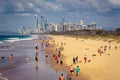 Surfers Paradise, Gold Coast, Australia - People on the beach with the panoramic view of the city in the background Royalty Free Stock Photo