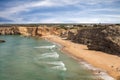 Surfers on portuguese beach near Sagres village