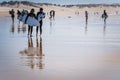 Surfers on the Portuguese beach Praia da Cova da Alfarroba