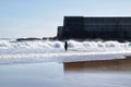 Surfers in Praia da Torre in Lisbon