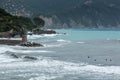 Surfers in rough sea at Ventigmiglia in northern Italy
