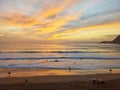 Surfers sunset beach group Portugal Royalty Free Stock Photo