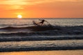 Surfers in the sunset at Playa negra, Costa Rica