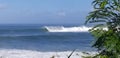 Surfers Surf a Large Winter Swell at Weimea Bay In Oahu Hawaii Royalty Free Stock Photo