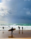 Surfers surfboards beach group Portugal