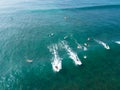 Surfers waiting to catch next wave