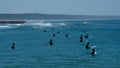 Surfers waiting for Wave and surfing