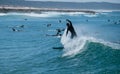 Surfers waiting for Wave and surfing