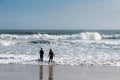 Surfers watching the waves