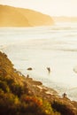 Surfers and Waves at Bells Beach, Australia Royalty Free Stock Photo