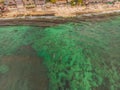 Surfers on the waves in the ocean, top view