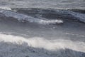 Surfing Big Waves in North Beach, Nazare. Royalty Free Stock Photo