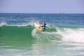 Surfing boy at Arpoador beach in Rio de Janeiro