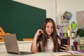 surfing in internet. happy childhood. teenager girl study in classroom. back to school. Royalty Free Stock Photo