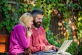 Surfing internet together. Family surfing internet for interesting content. Couple in love notebook consume content Royalty Free Stock Photo