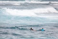 Surfing Paddling at Sunset Beach Hawaii Royalty Free Stock Photo