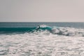 Surfing perfect waves at Madraba, Taghazout, Morocco