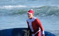 Surfing Santa`s on the beach